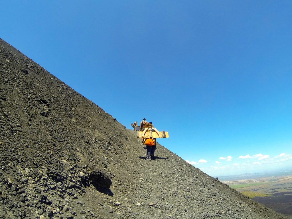 Walking up Cerro Negro with volcano boards