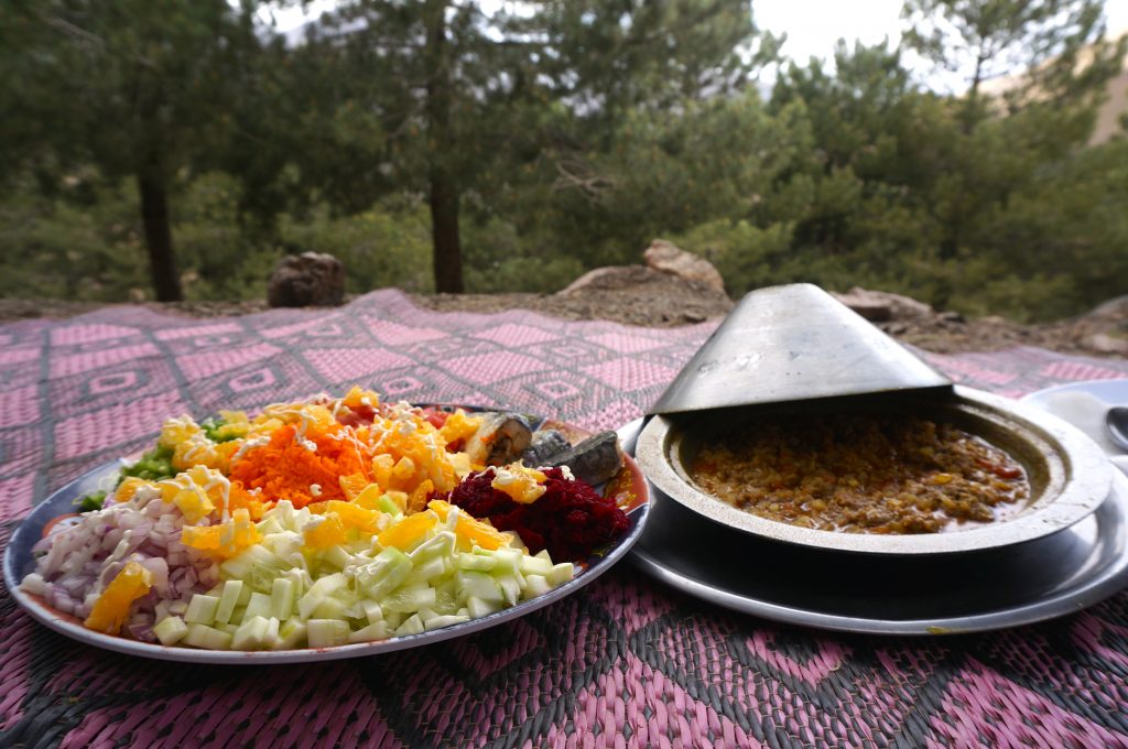 tangine and salad picnic while trekking the Atlas Mountains and Imlil Valley