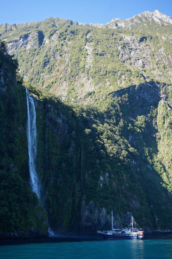 Mildford Wanderer Cruise enters Stirling Falls in the Milford Sound