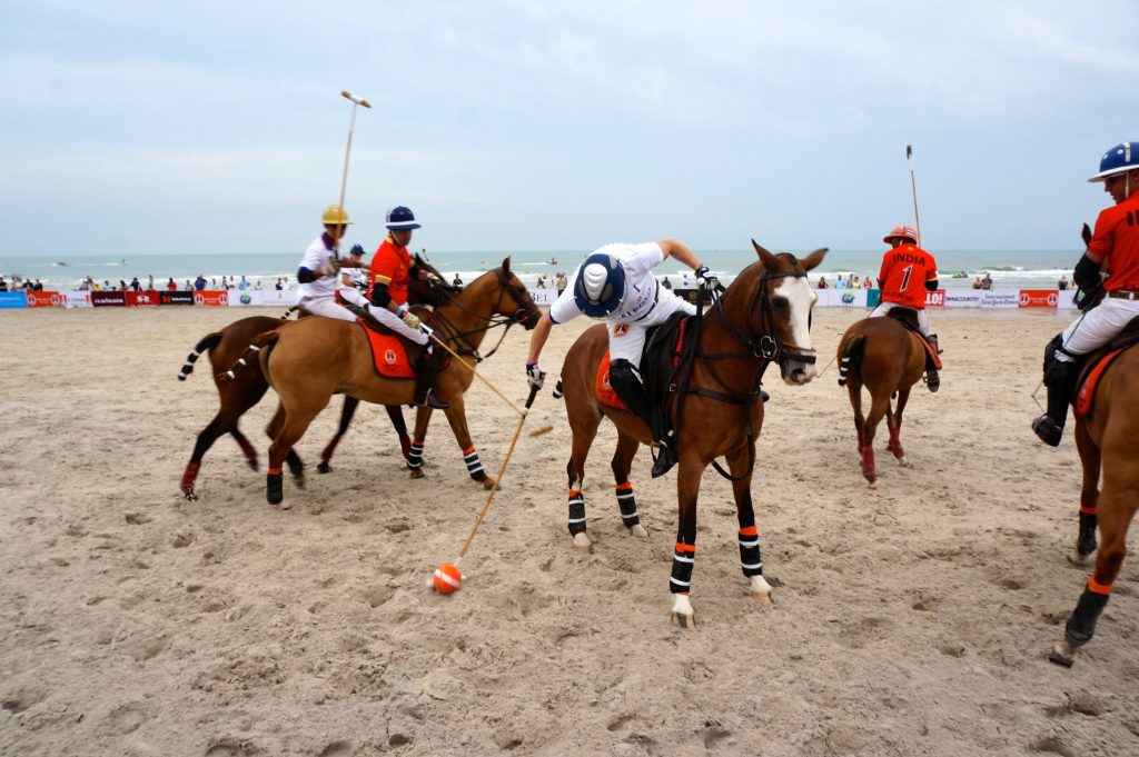 Polo players and their horses getting the match underway
