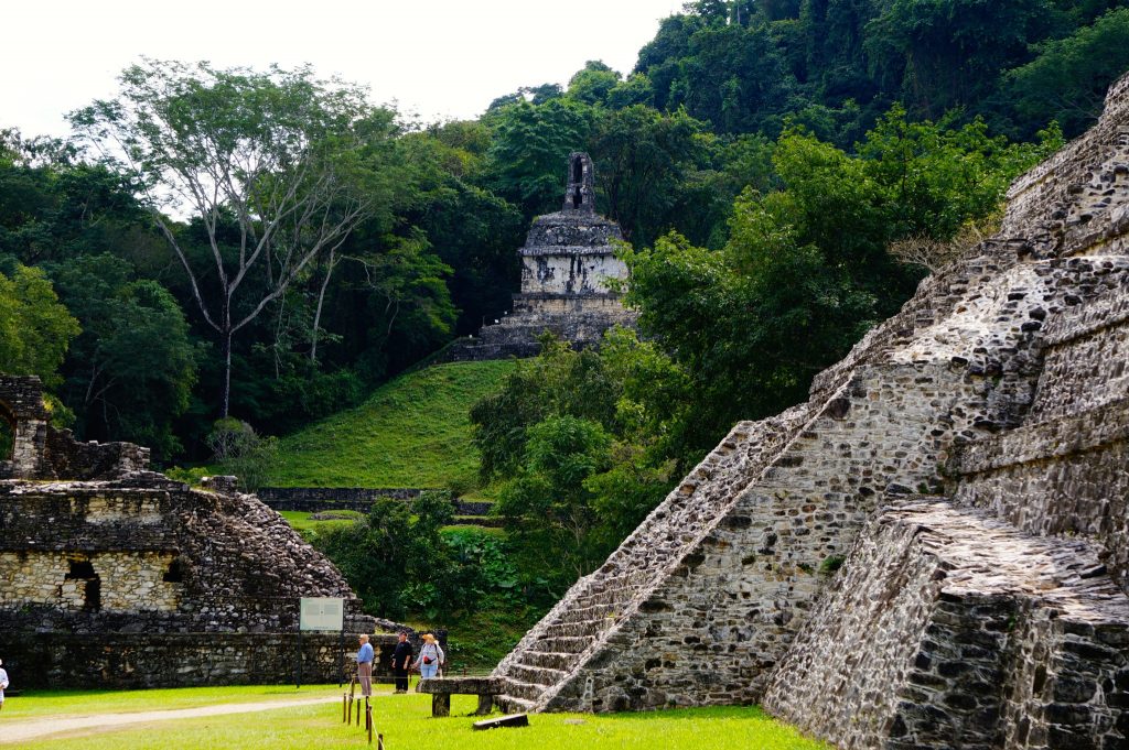 tourists at Palenque ruins Mexico