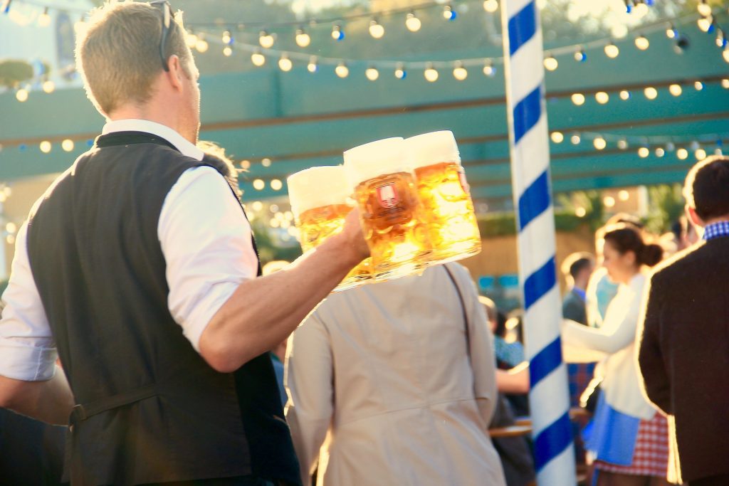 A beer server carrying liters is always someone you should be tipping at Oktoberfest in Munich