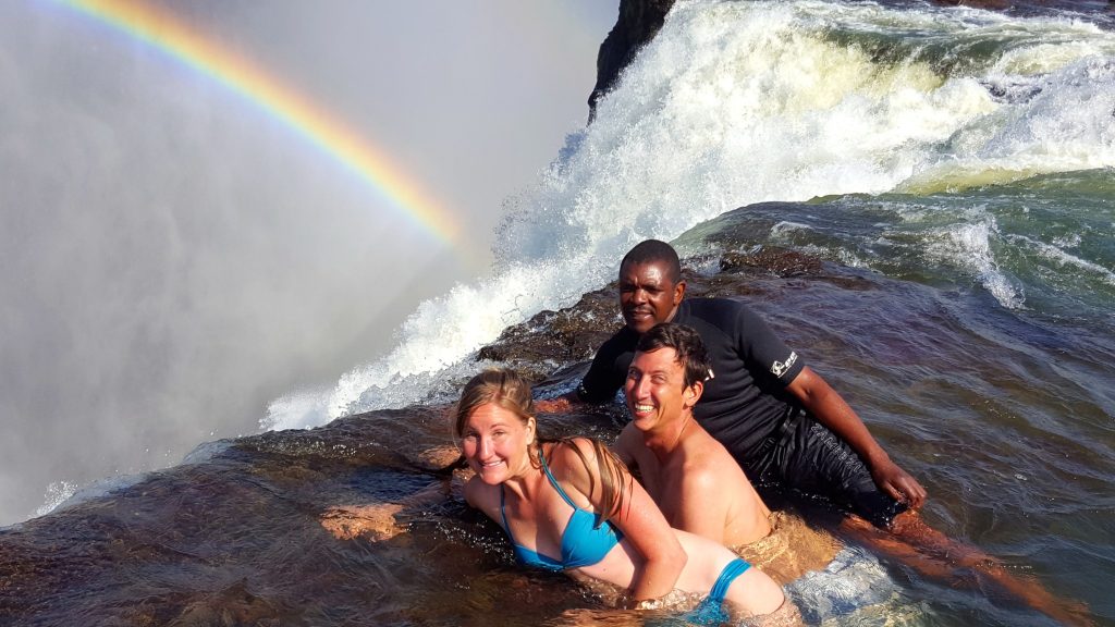 Showing how to visit Devil's Pool Victoria Falls - lay right down on the edge of the waterfall!