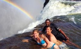 Showing how to visit Devil's Pool Victoria Falls - lay right down on the edge of the waterfall!