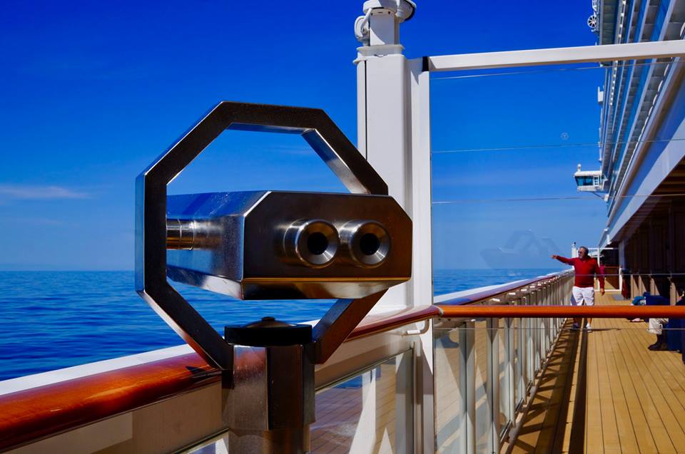 Binoculars on a cruise searching the ocean