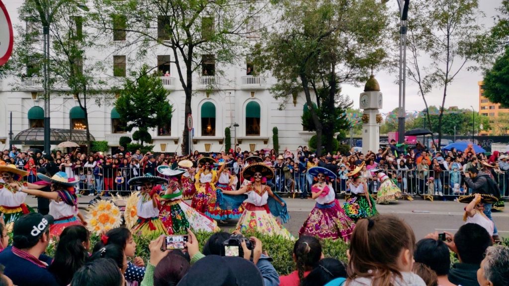 Day of the Dead parade traditional dancers in Mexico City